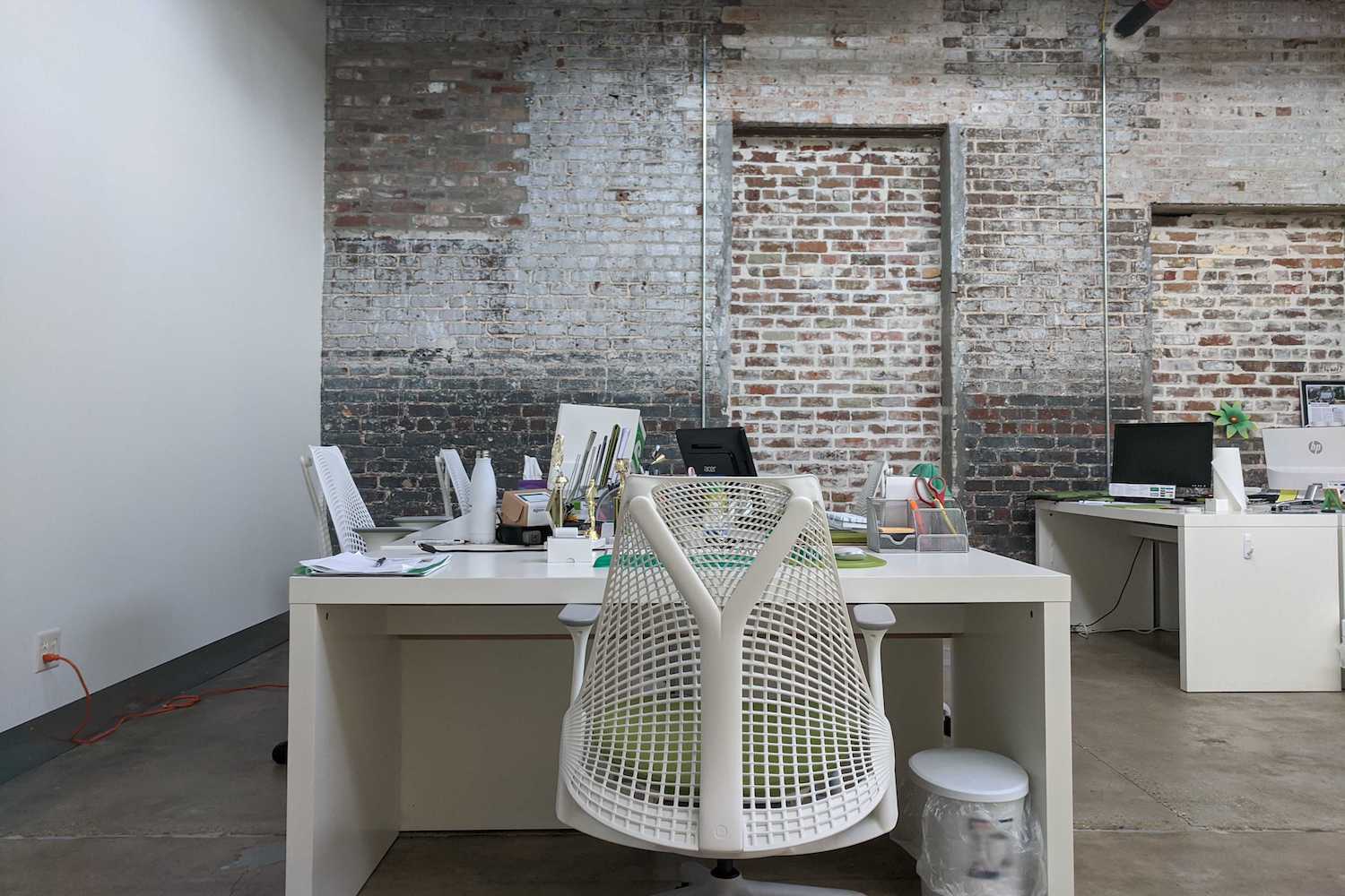 Empty desk at Online Optimism office