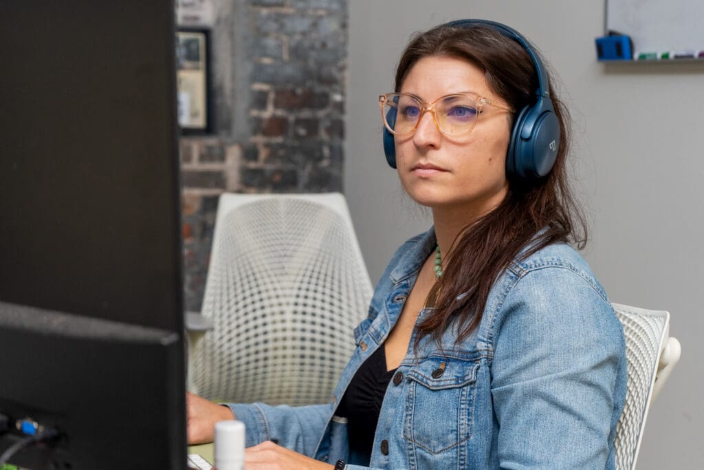 Sara works on her computer