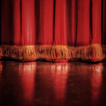 Closeup of the bottom of a stage curtain