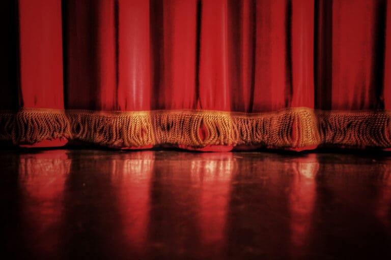 Closeup of the bottom of a stage curtain