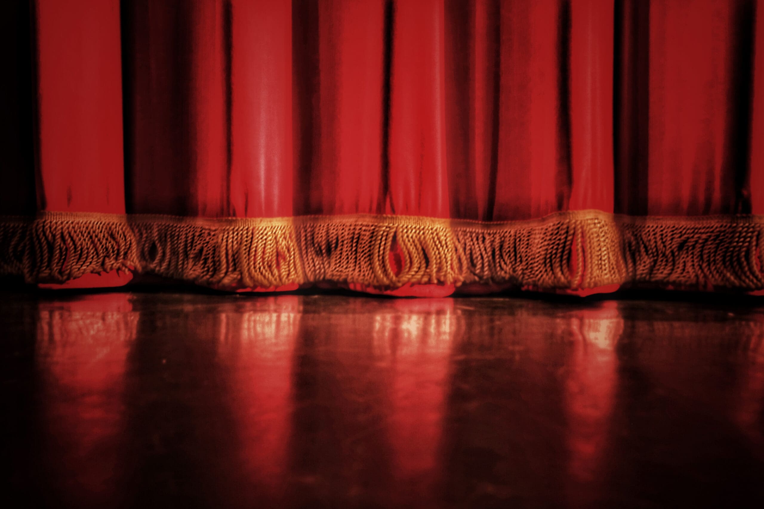 Closeup of the bottom of a stage curtain