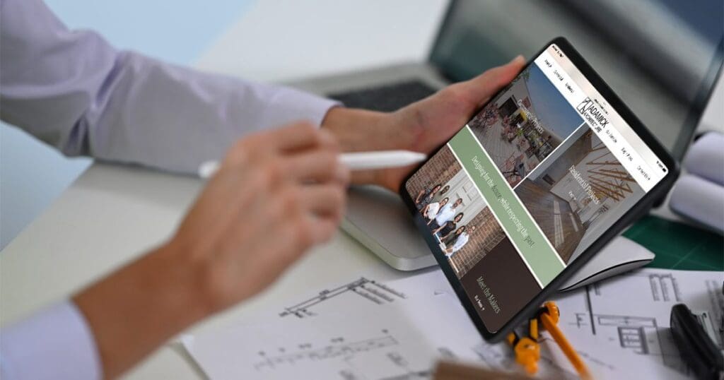 Adamick Architecture website on a tablet screen