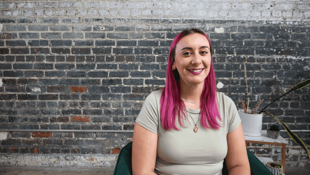 Madison smiles in the office