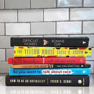 A stack of books of various colors