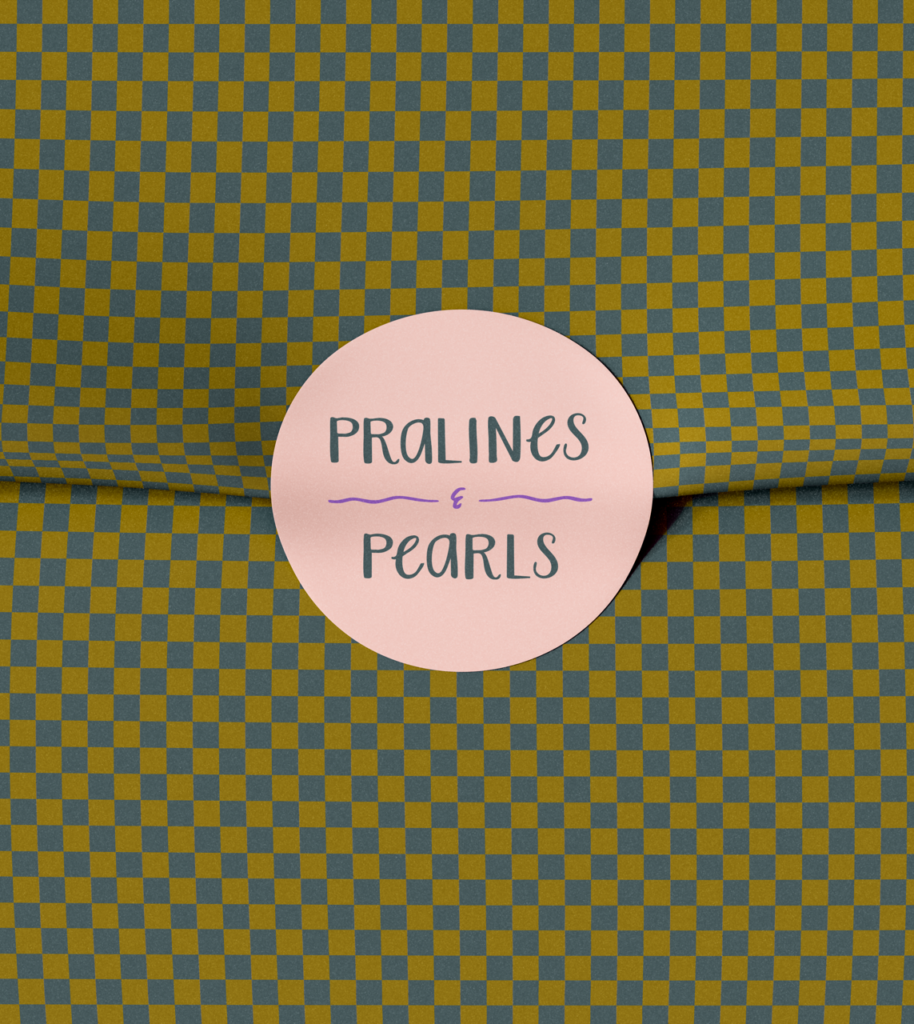 Gift wrap with checker pattern and Pralines & Pearls logo sticker