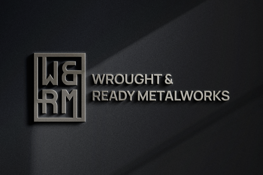 Mockup of Wrought & Ready Metalworks logo cut out of metal