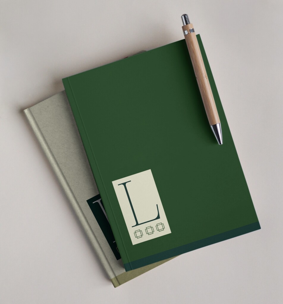 Notebook with Lagniappe Law logo